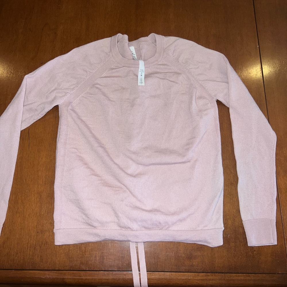 Baby light pink Lululemon long sleeve with a tie back